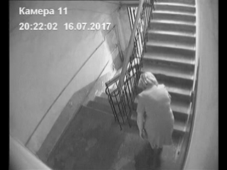 a pissing neighbor started up in orsk: a woman relieves herself in the porches